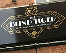 Blind tiger sign external